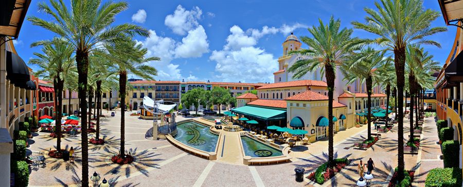 Palm-lined plaza with fountains